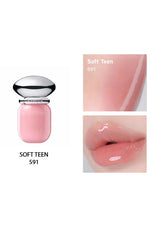 Pink lip balm with a silver cap on a white background, showing close-up of color and application.