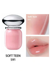 Pink lip balm with a silver cap on a white background, showing close-up of color and application.