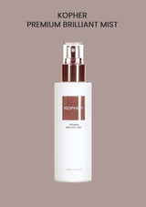 Kopher Premium Brilliant Mist bottle on a beige background