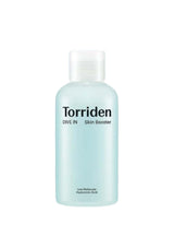 A clear plastic bottle labeled 'TORRIDEN Skincare Range' with a pump dispenser, containing a light blue liquid which is likely a cleansing foam or serum.