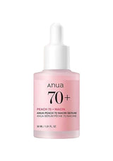 Pink skincare serum bottle with dropper labeled 'Anua' on a white background