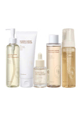 Set of skincare products with visible branding on a white background