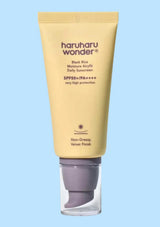 HARUHARU WONDER Black Rice Moisture Airyfit Sunscreen SPF50+/PA++++ on blue background