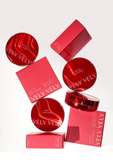 Red cosmetic products with 'VELY VELY' branding on a white background