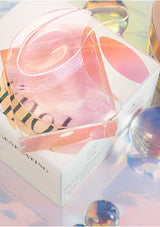 A box of K-SECRET Advanced Regenerating Eye Gel Patches with Retinol. The packaging is predominantly pink and white, with text and branding.