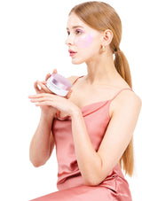 A box of K-SECRET Advanced Regenerating Eye Gel Patches with Retinol. The packaging is predominantly pink and white, with text and branding.