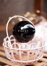 Packaging of GSLEY Bubble Bomb Pack which is a black spherical container with product details in white and red text, presented alongside its box which has similar color scheme and branding.