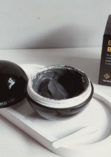 Packaging of GSLEY Bubble Bomb Pack which is a black spherical container with product details in white and red text, presented alongside its box which has similar color scheme and branding.