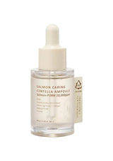 Salmon Caring Centella Ampoule bottle on a white background