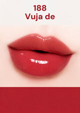 Close-up of a lip with a red lipstick shade labeled '188 Vuja de' on a white background.