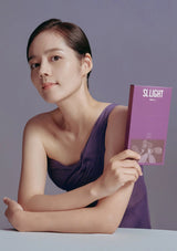 Woman holding a purple product packaging against a gray background