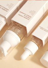 HEVEBLUE Salmon Caring Centella Special Travel Kit, including a bubble cleanser, toner, ampoule, and cream in a transparent plastic packaging with a handle.
