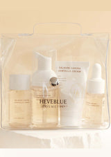 HEVEBLUE Salmon Caring Centella Special Travel Kit, including a bubble cleanser, toner, ampoule, and cream in a transparent plastic packaging with a handle.