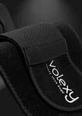 Black exercise band with 'Volexy' branding on a dark background