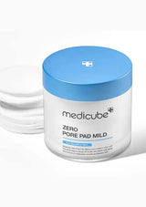 Jar of Medicube Zero Pore Pad Mild with blue lid on a white background