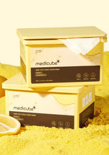 Two boxes of Medicube Deep Vita C Daily Quick Mask on a yellow background