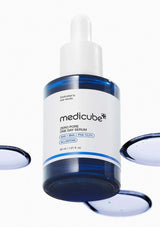 Medicube serum bottle with dropper on a white background