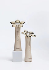 Two flaner hair styling tools on a white background