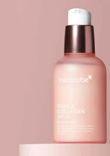 Medicube Triple Collagen Serum bottle on a pink background