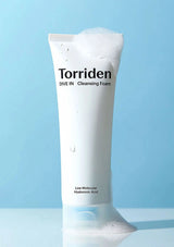 Torriden cleansing foam tube on a light blue background