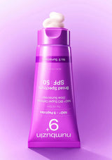 Purple skincare product with white cream on a purple background