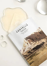 Product packaging with mountain design and text on a white surface
