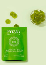 Green Fitany package with gummy candies on a light green background