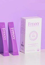 Fitany product packaging with two purple packets on a light purple background