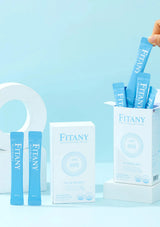FITANY products including packets and a box on a light blue background