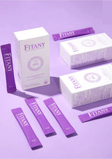 Fitany products including boxes and packets on a purple background