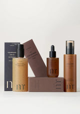 Collection of skincare products with visible branding on a white background