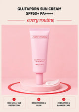 Every Routine GlutaPDRN Sun Cream SPF50 tube with cream texture on a pink podium