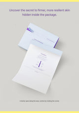 An open white paper booklet with purple text and a vertical purple measurement scale, shown alongside a matching white envelope on a light gray background. Purple headline text at the top reads, 'Uncover the secret to firmer, more resilient skin hidden inside the package.
