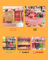 Display of Shake Baby products in various stores with brand logos.