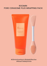 Orange tube of Roomin Pore Cerasome Plus Wrapping Pack with a applicator on a pink background