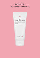 Medicube Red Foam Cleanser tube on a pink background