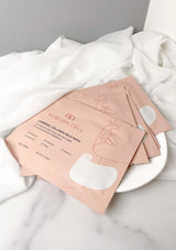 Nuborn Cell neck mask packaging on a white surface with a gray background