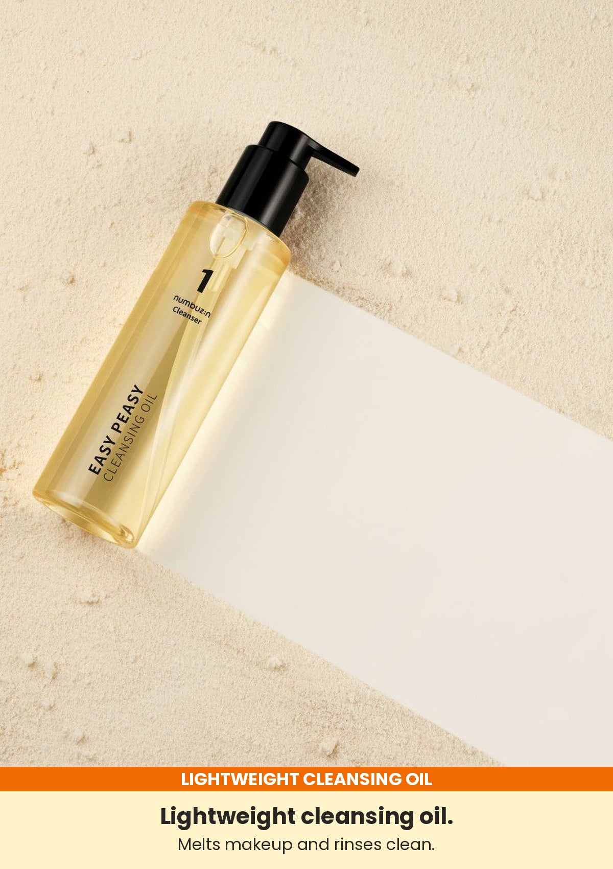 Numbuzin No.1 Easy Peasy Cleansing Oil bottle on a warm textured background