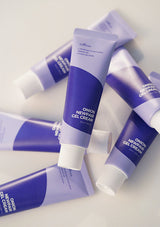 Multiple tubes of Onion Newpair Gel Cream on a light background