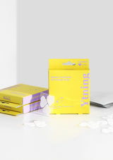 Yellow and purple boxes with 'Yiming' branding on a white surface.
