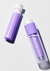 Two purple bottles with white caps on a light gray background