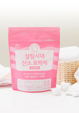 Pink packaging of a product with text on a white background