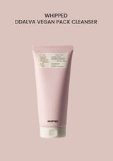 Pink tube of DDALVA Vegan Pack Cleanser on a pink background