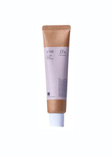 Tube of cream with a brown cap on a white background