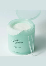 ABIB Green LHA Pore Pad open jar with 70 pads and tweezers