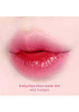 Lips wearing Dailychips Haru water tint #02 Twilight on a light pink background