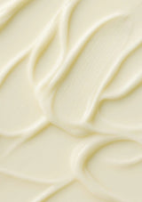 Close-up of a textured cream-colored surface with wavy patterns