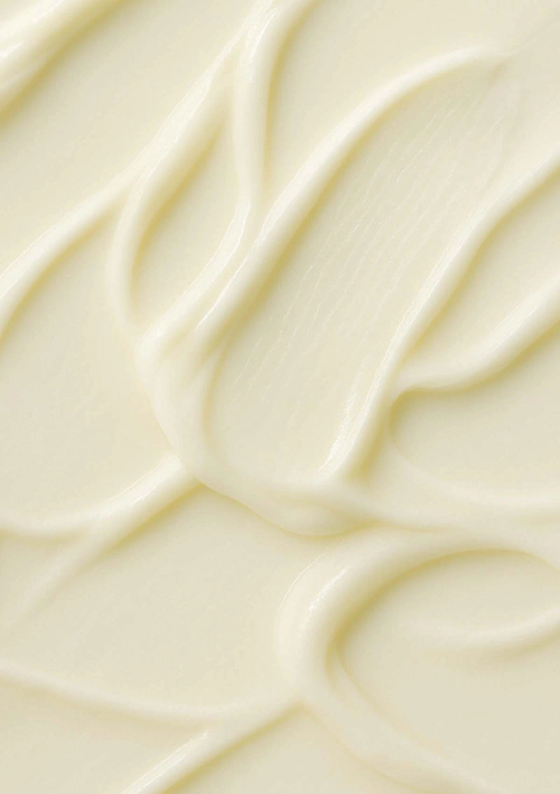 Close-up of a textured cream-colored surface with wavy patterns