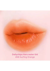 Lip with Dailychips Haru water tint #08 Surfing Orange on a pink background