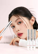 Woman holding a makeup product with three similar products displayed below on a light pink background